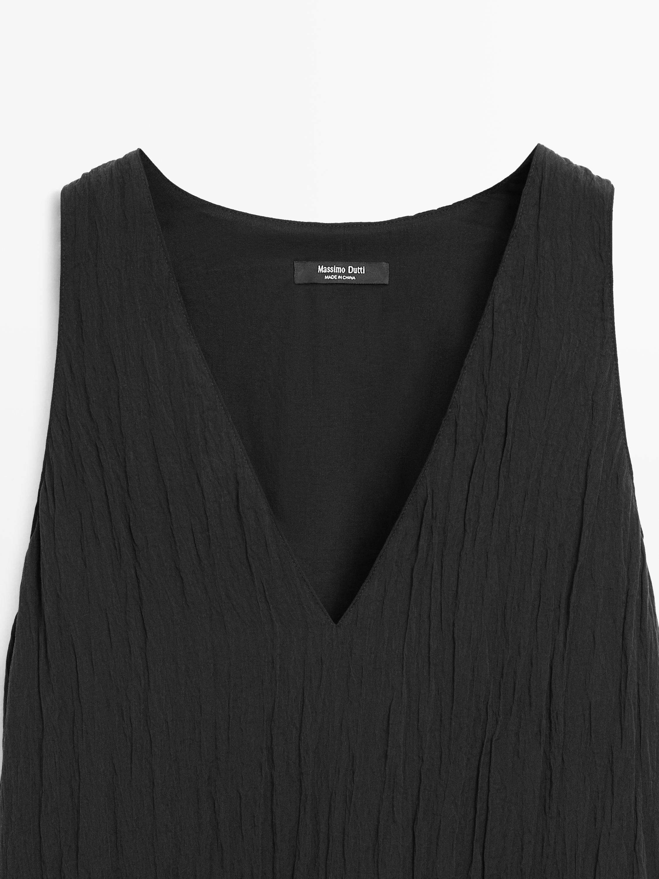 Robe midi fluide plissée